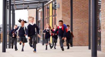 Primary School Kids Running at the End of School Day