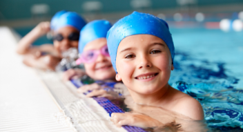 Children in Water at Edge of Pool